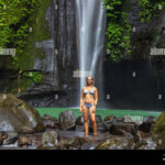 A Young Woman In Swimming Suit Is Posing At Hidden Waterfall Near For Hidden Pictures Swimming Jpg